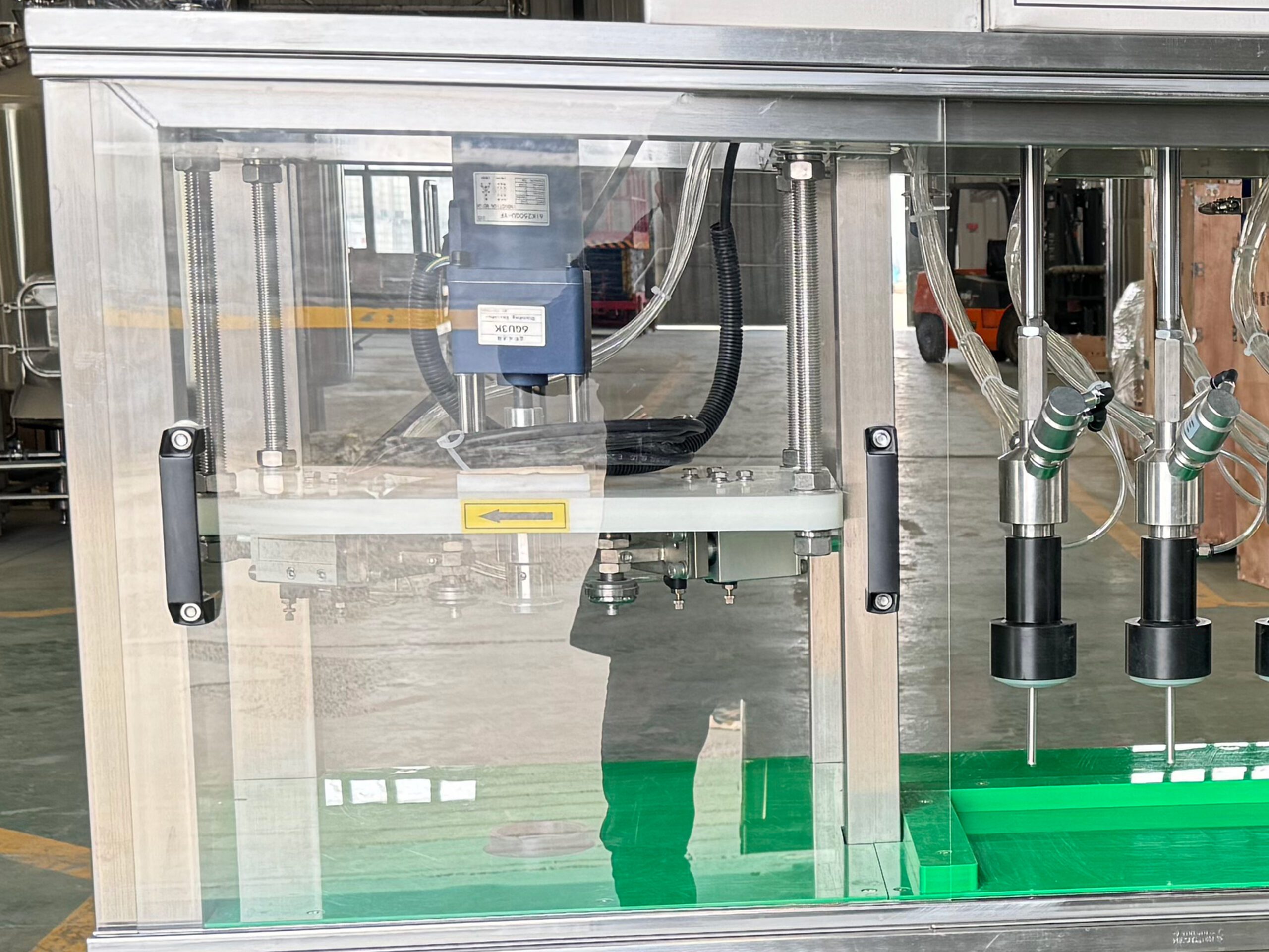 11 scaled Bottle&Can Filling, Capping & Sealing Integrated Machine